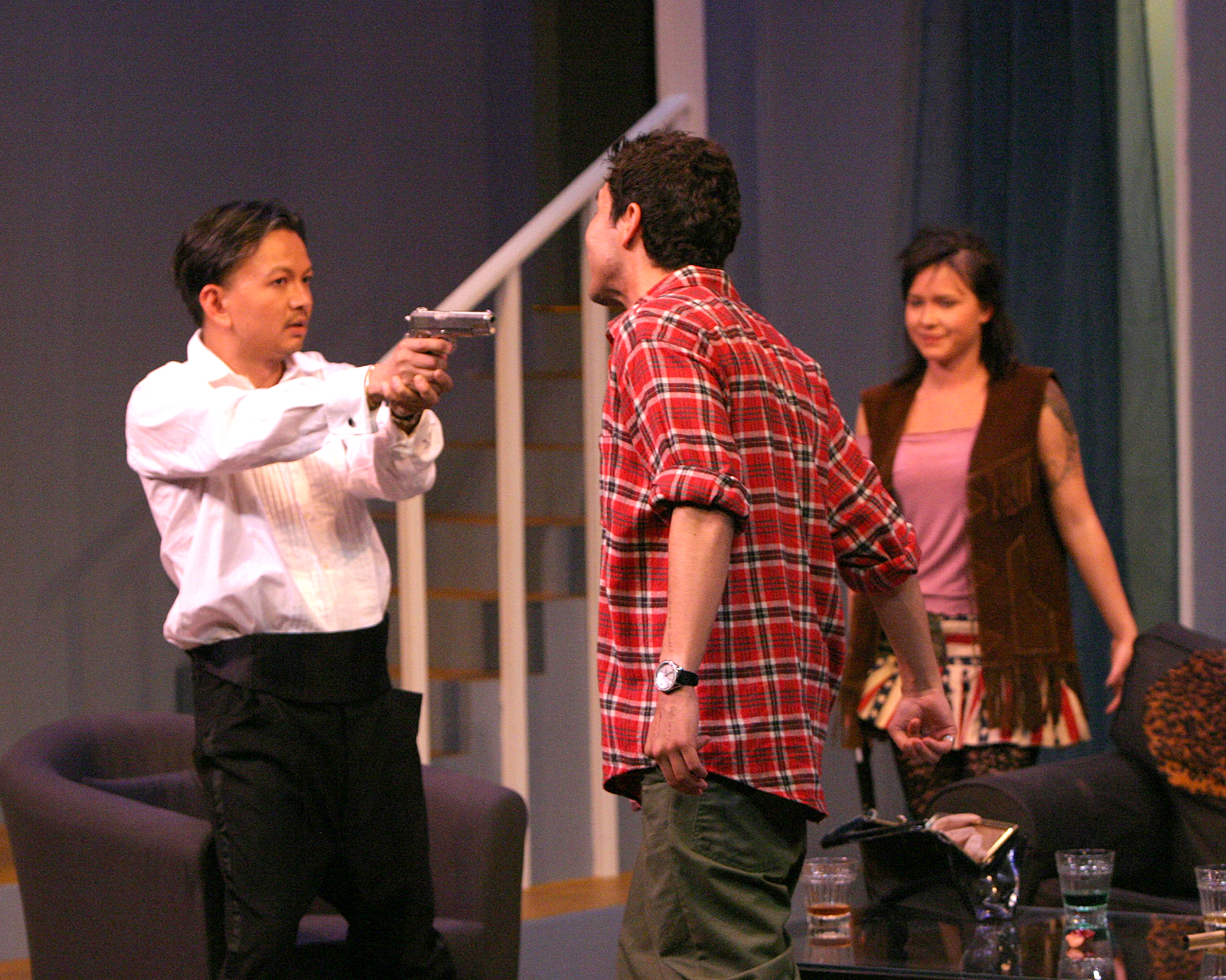 Kevin Trang as protagonist Bruce Delamitri, arming himself from Wayne Hudson in play 