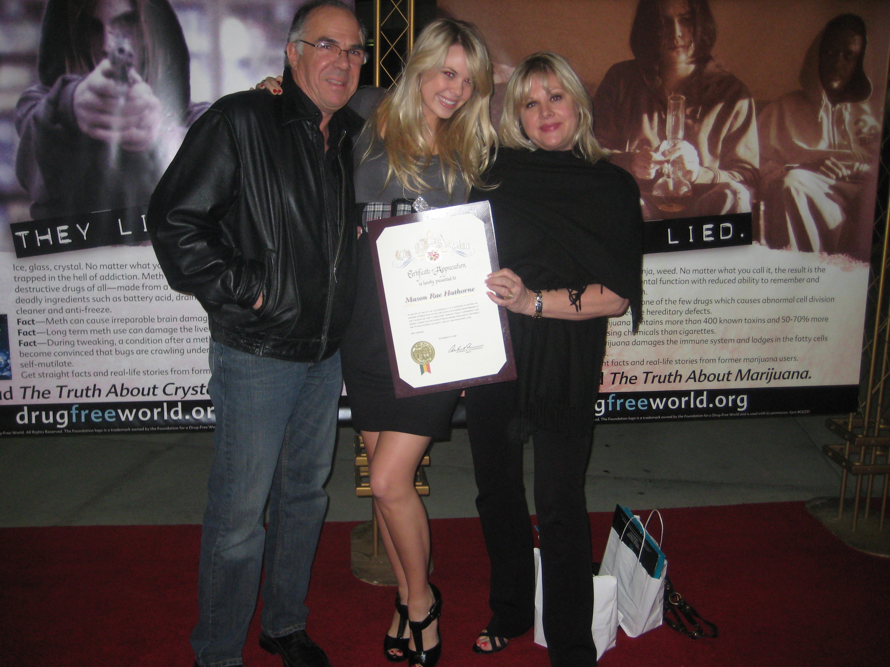 Mason Rae & her family on the Red Carpet w/ Mason's award from the Mayor of Los Angeles 2009