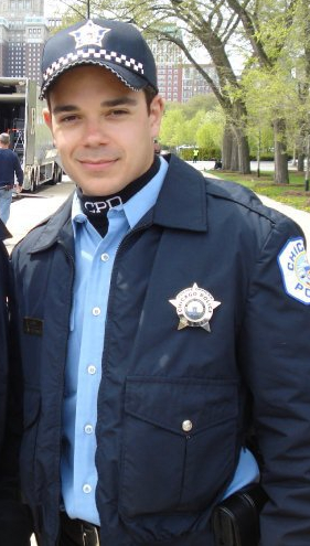 Carlo Aparo as a Chicago Police Officer