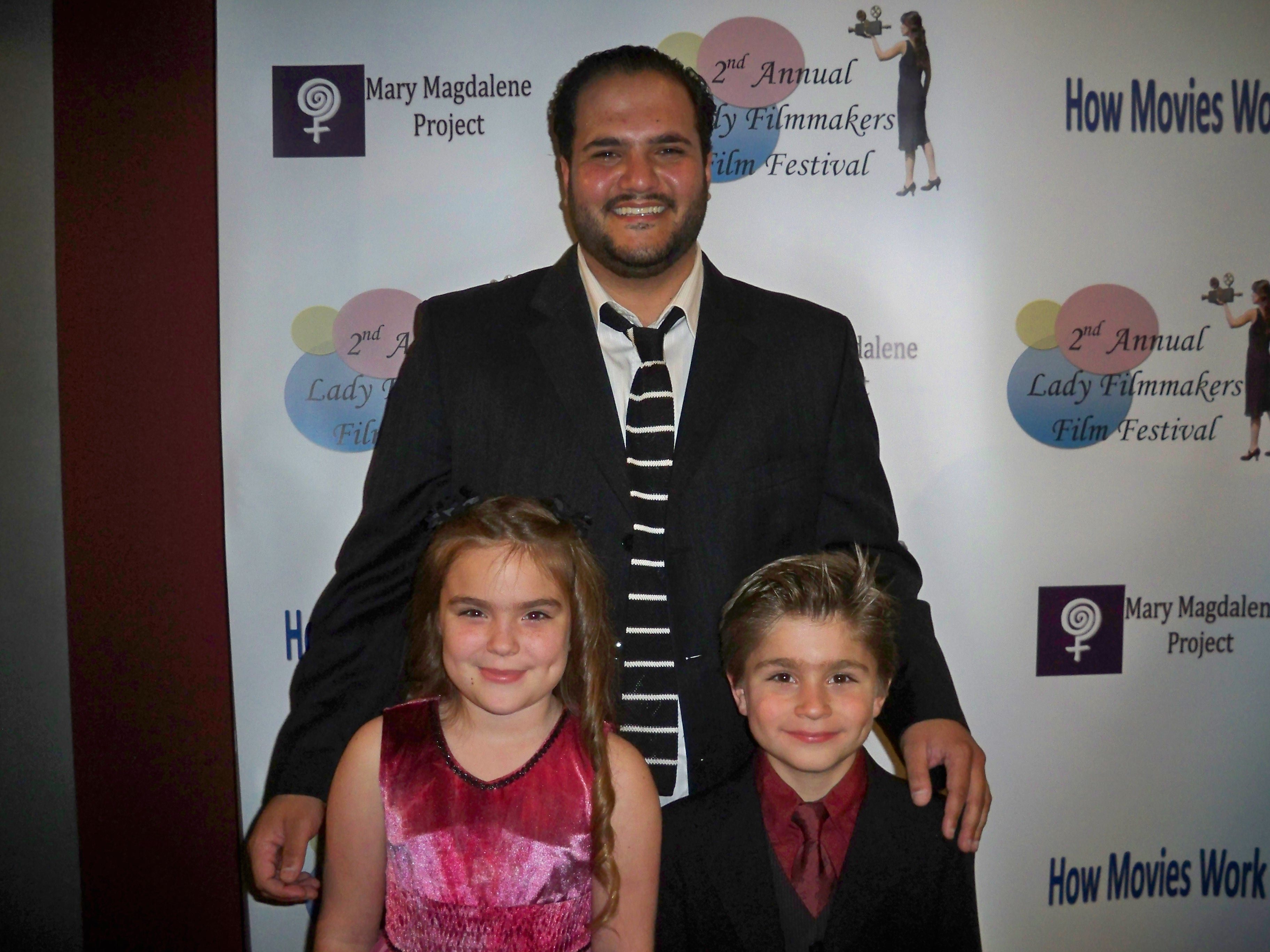 At the premiere of The Boy who became king is HannaH Eisenmann and Stone Eisenmann with the writer of the film.