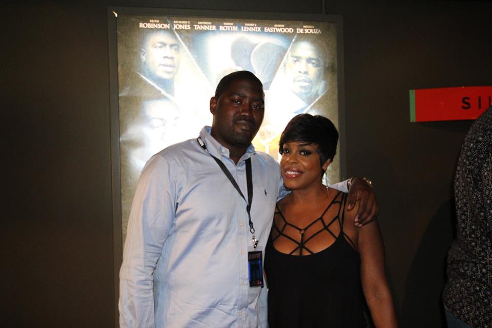 Oliver W. Ottley III with Niecy Nash at the 2014 American Black Film Festival.