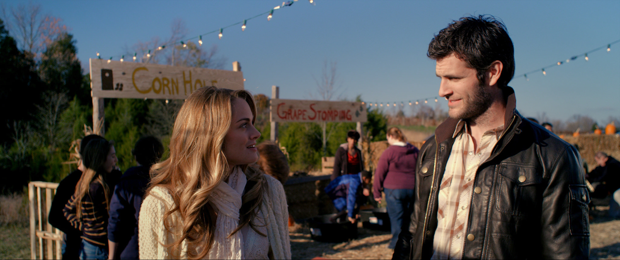 Still of Ali Faulkner and Alan Powell in The Song (2014)