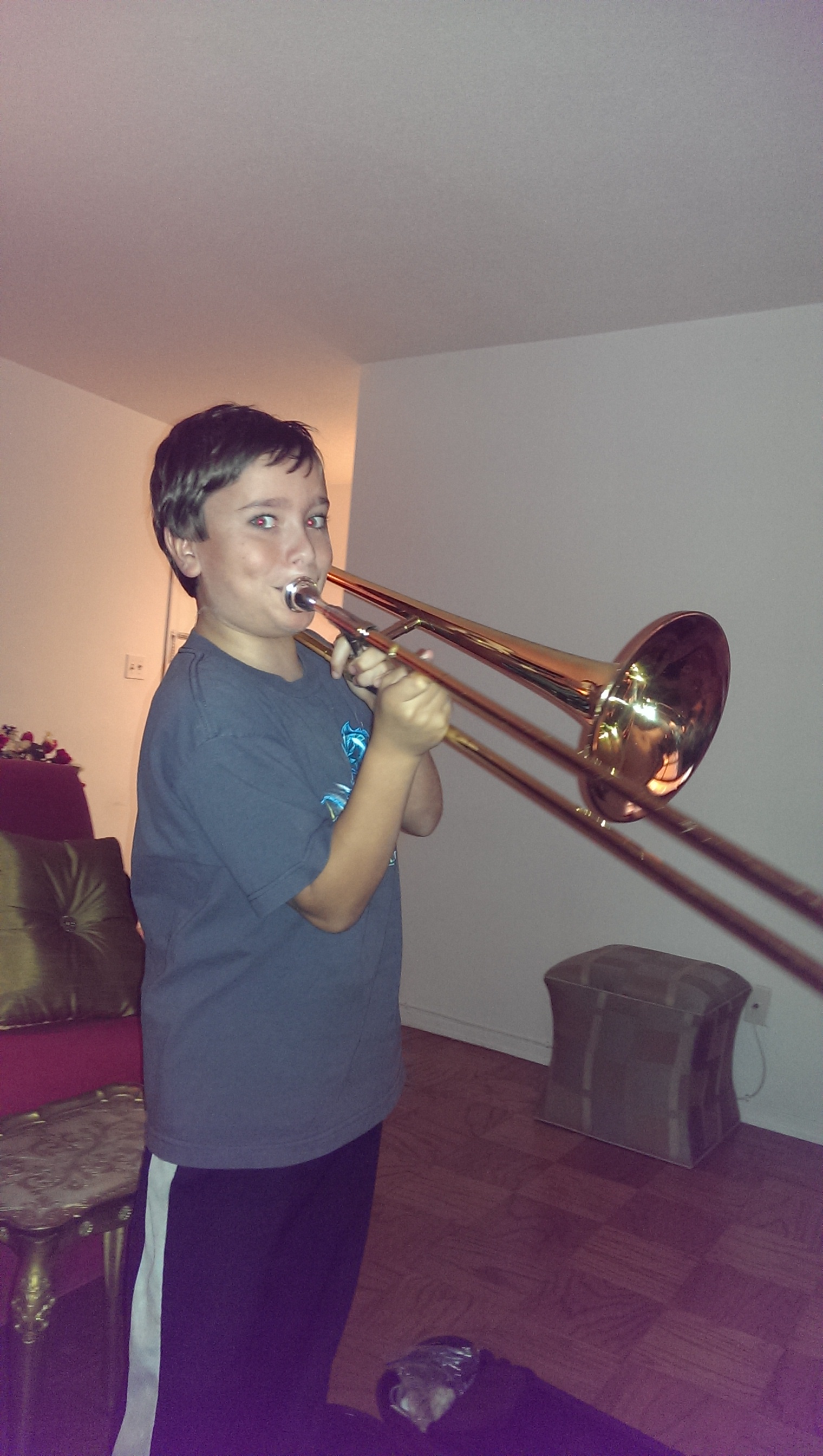 His new favorite instrument - the trombone! 