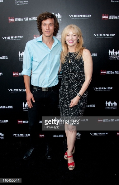 Josiah Lipscomb (L) and actress Frances Fisher arrive at the Artists for Peace and Justice 'A Ring to Educate a Child in Haiti' launch event at Vhernier Beverly Hills on June 15, 2011 in Beverly Hills, California