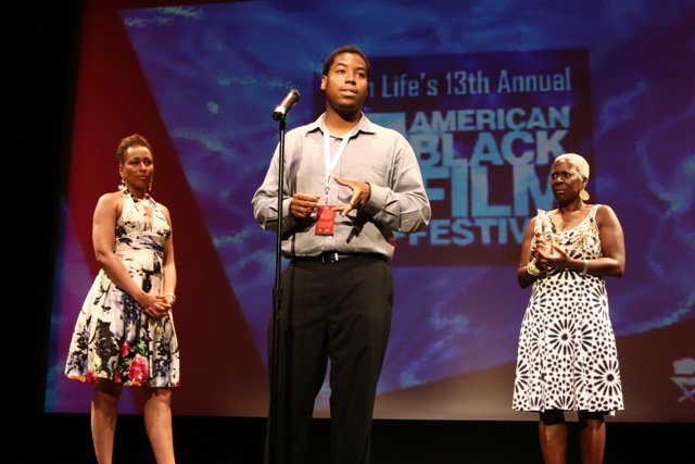 Kiel Adrian Scott on stage at the 2009 American Black Film Festival accepting the Award for the HBO Short Film Competition.