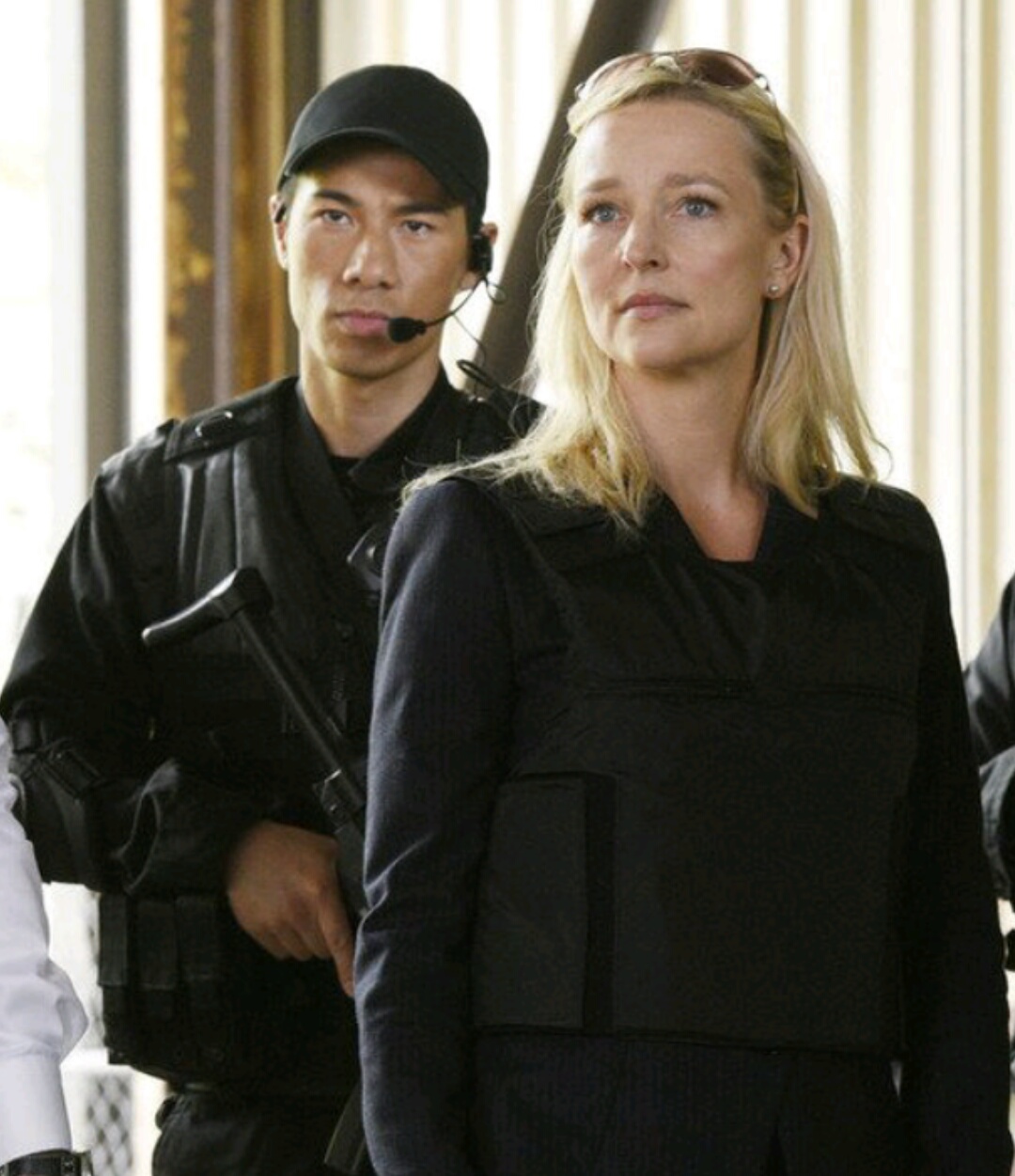Kari Matchett and Owen Kwong on the set of Covert Affairs.