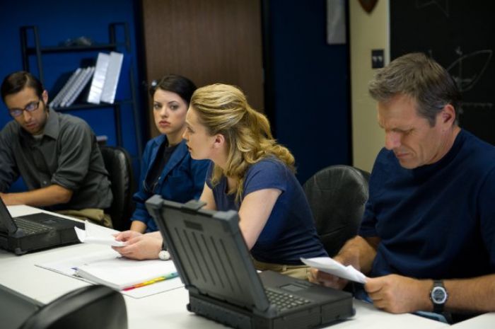 Freeman (Mitch), Maddie (Emily Sandifer), Tessa (Monica Keena), and John (Alex Carter) weigh their options. Production still, 40 Days and Nights.