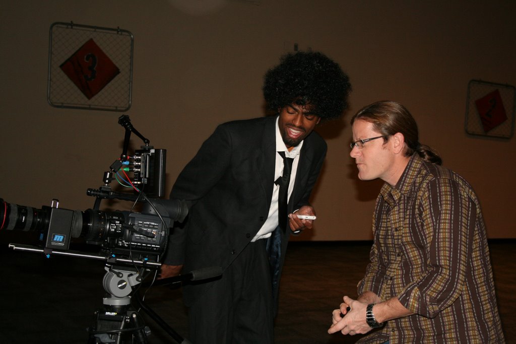 Kent Smith works with Chris Crutchfield on set.