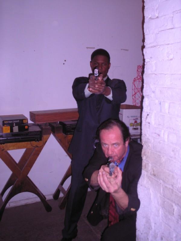 Bill Stoneking (Congressman Matthew Walden) and Harold Dennis (Detective Ken Marshall) on the set of 