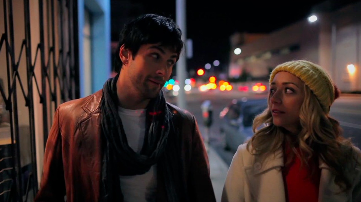 Still caption Michael Alperin and Sarah Scott in The Flames of My Love (2013).