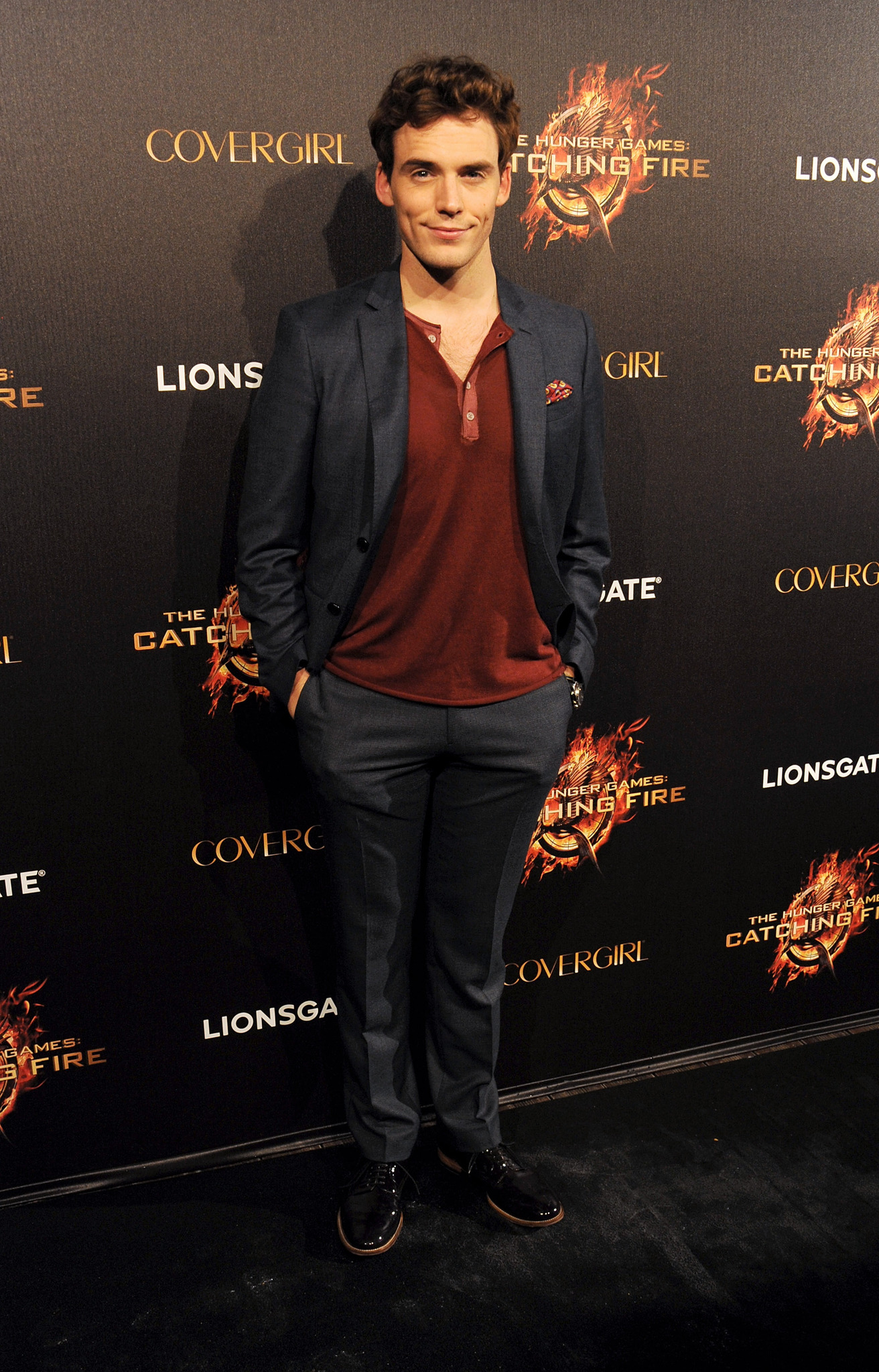 Sam Claflin at event of Bado zaidynes. Ugnies medziokle (2013)