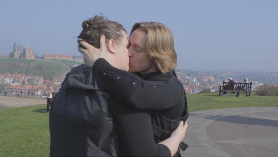 Touching embrace on location for Salvatus