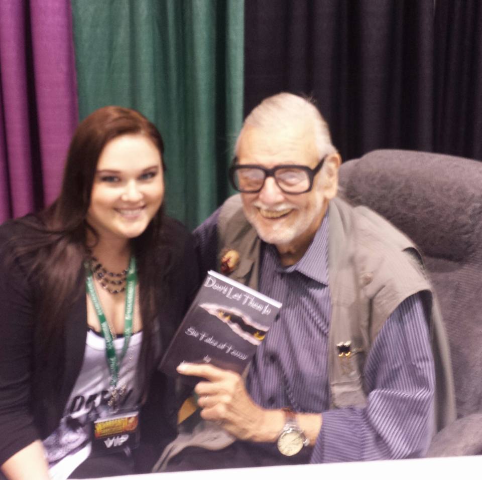 Elizabeth and Mr. George Romero discussing her best seller, 