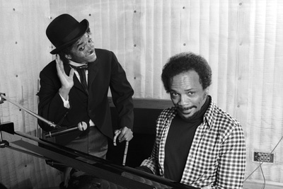 Michael Jackson and Quincy Jones composing songs in a Los Angeles recording studio