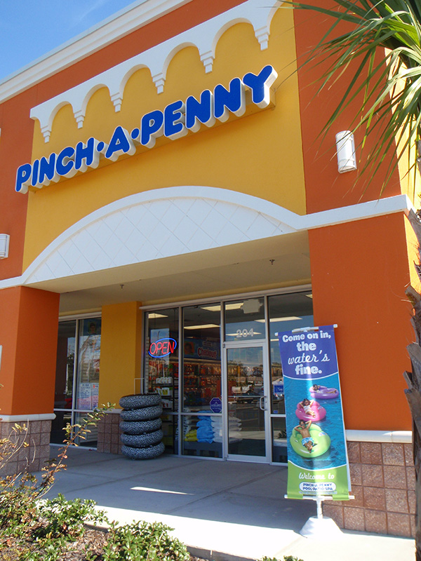 Banner in front of Pinch-a-Penny.