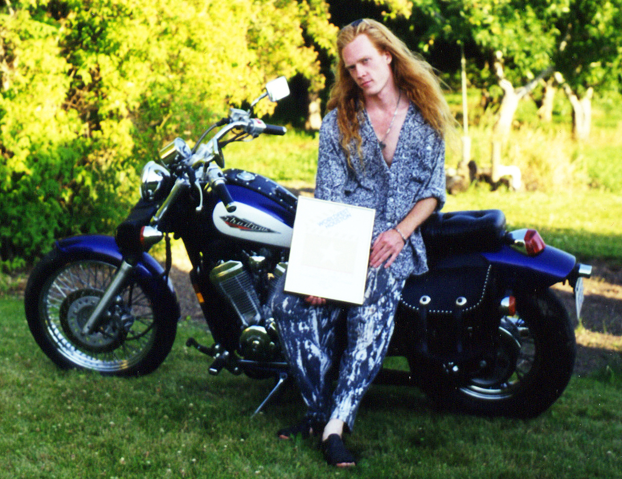 Heath and his '95 Honda Shadow 600 with his 32nd Worldfest Houston Gold win for Pictorial Forest, 1999.