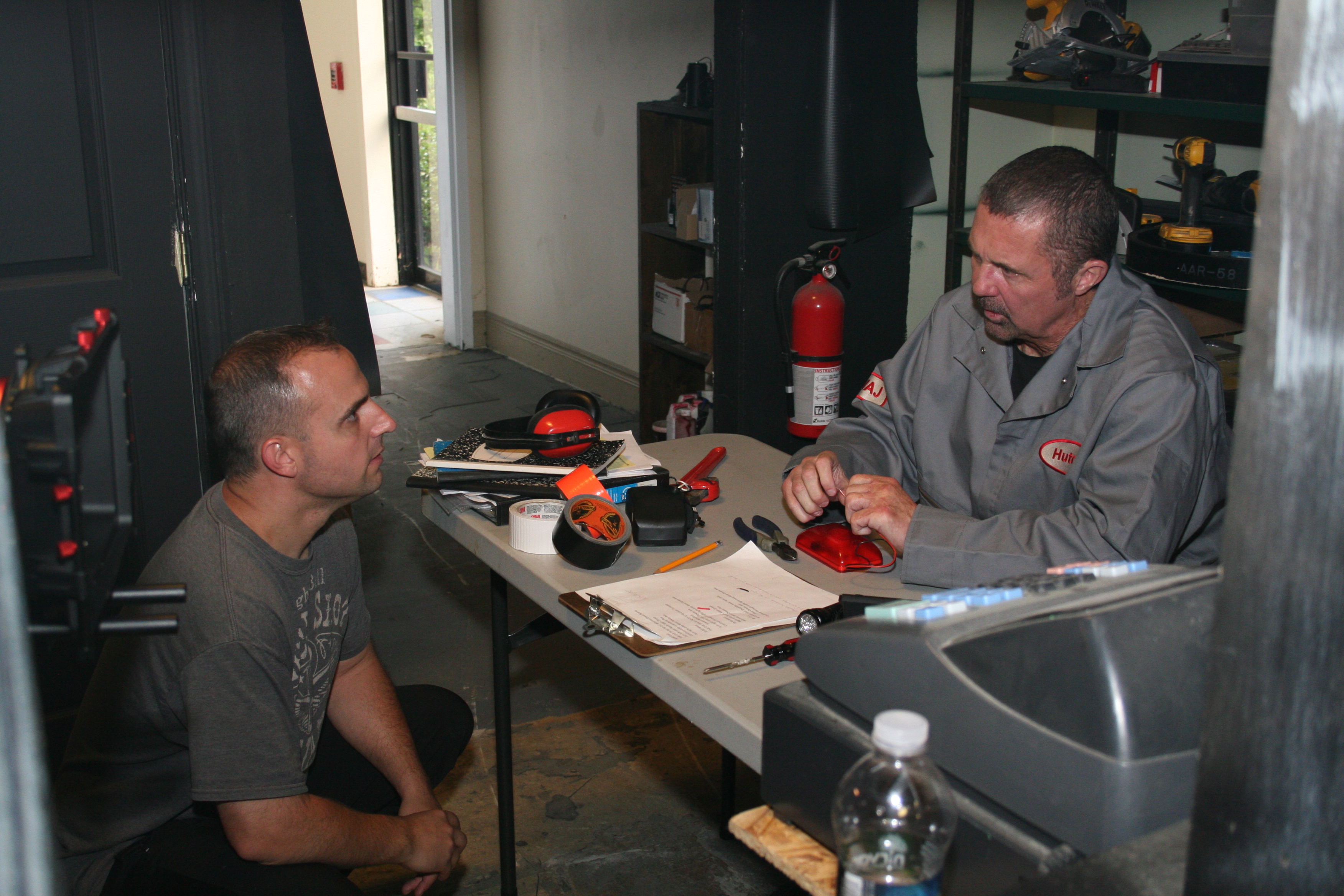 Mike Lordi and Kane Hodder on the set of ABANDONED IN THE DARK (2014).