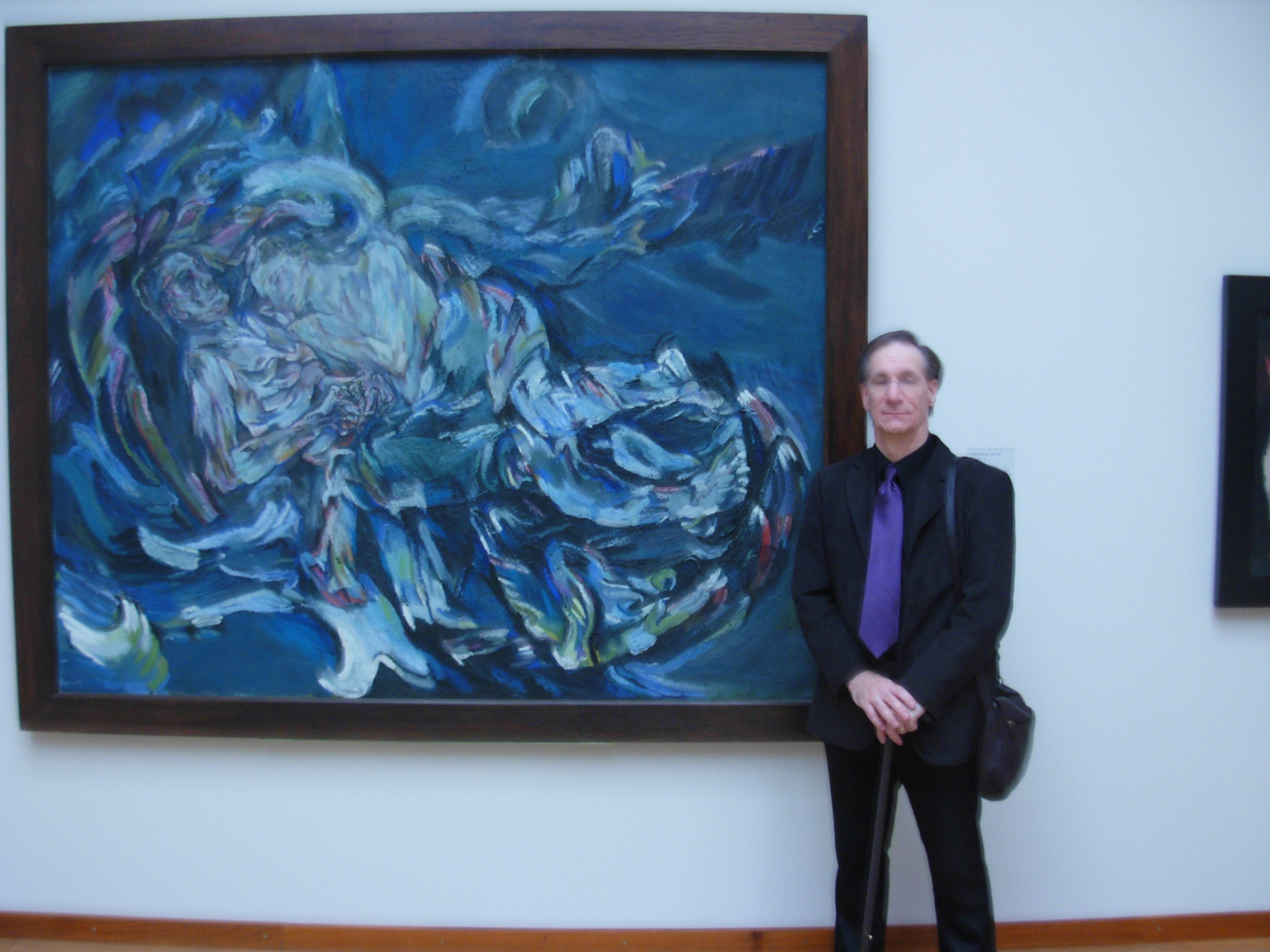 Ken Ludden poses at Kuntsmuseum Basel by Oscar Kokoshka painting 