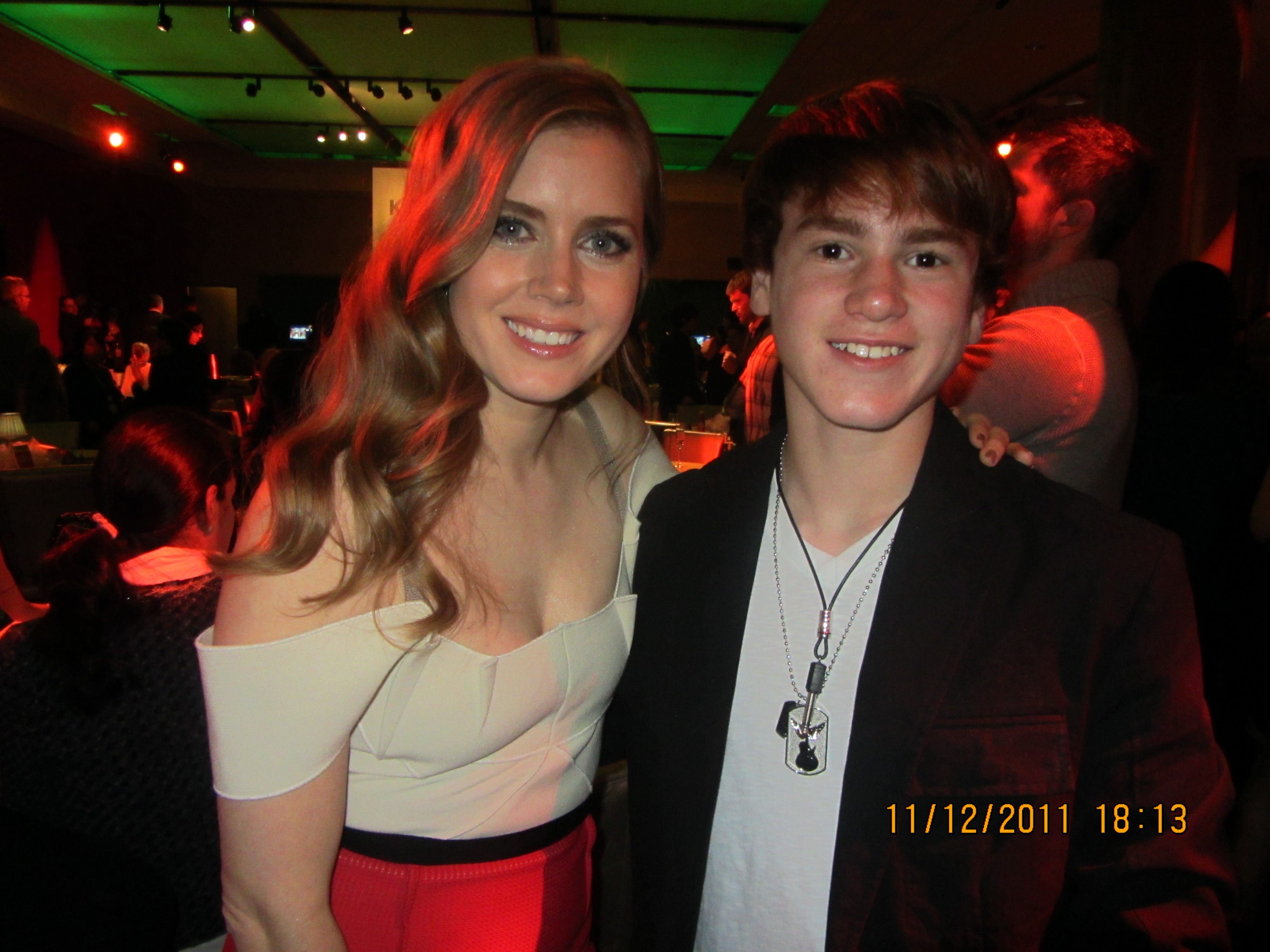 Justin Tinucci with Amy Adams at the premiere of The Muppets November 12 2011 at the El Capitan Theatre, Hollywood.