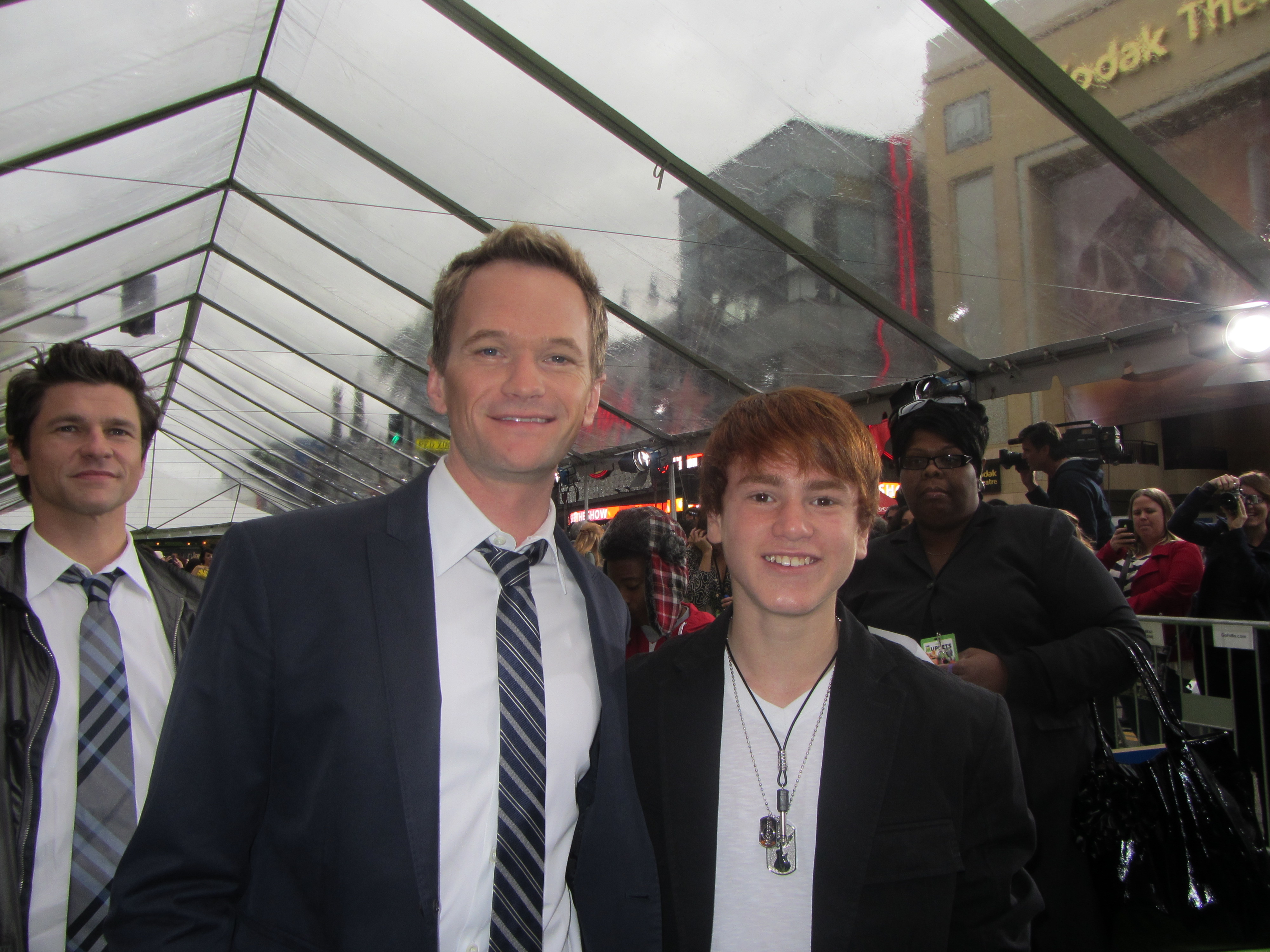 Justin Tinucci with Neil Patrick Harris at the premiere of The Muppets November 12 2011 at the El Capitan Theatre, Hollywood.