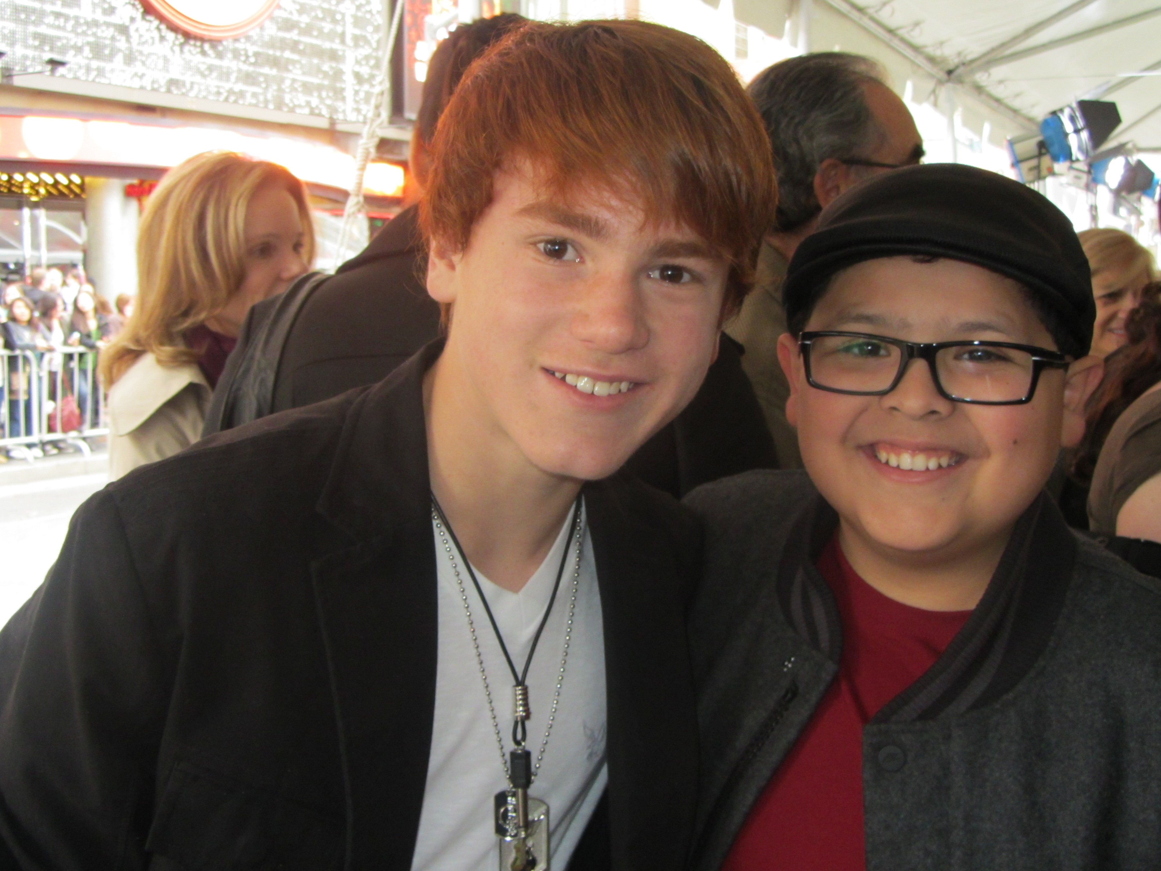 Justin Tinucci with Rico Rodriguez at the premiere of The Muppets November 12 2011 at the El Capitan Theatre, Hollywood.