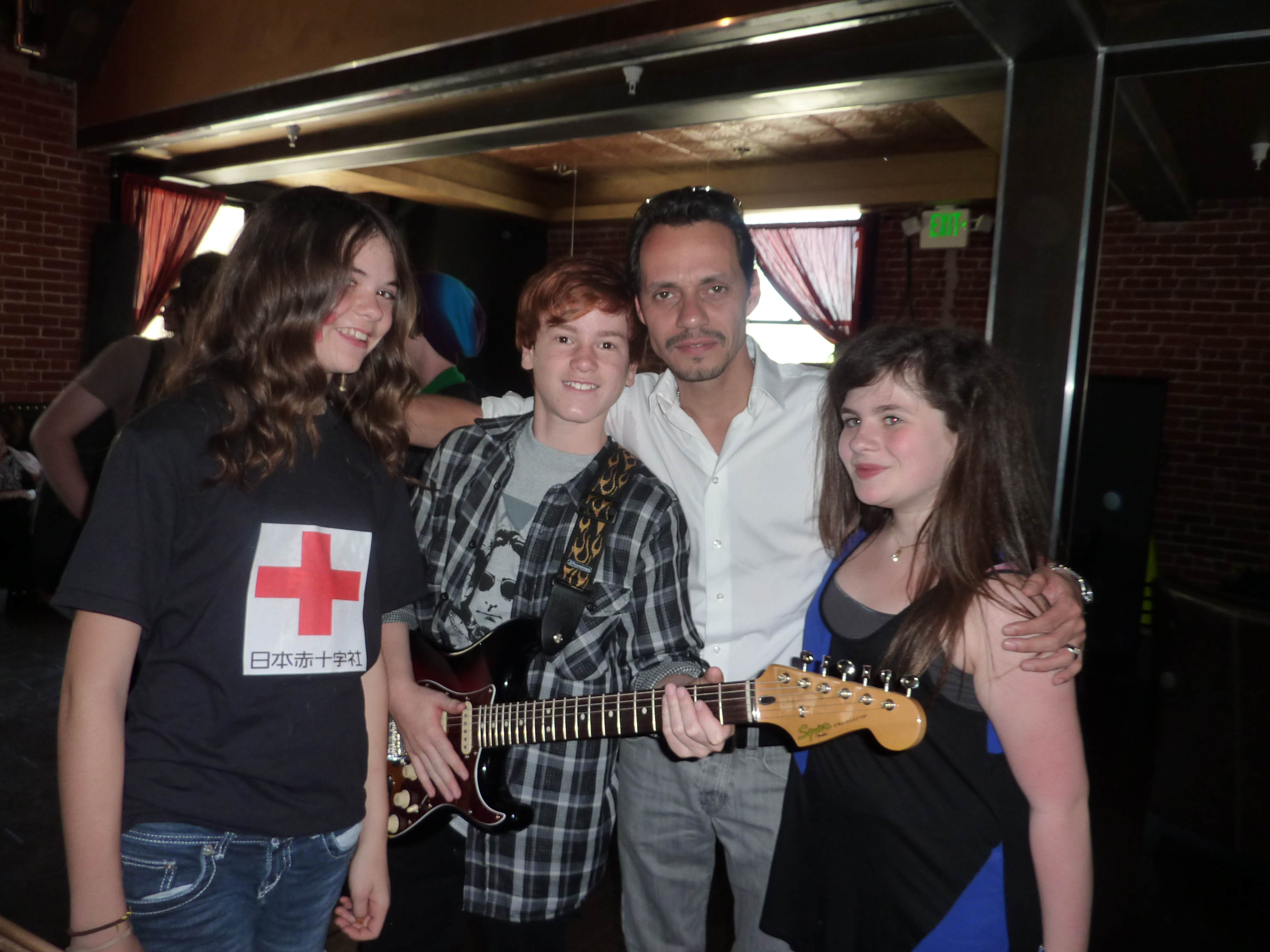 Justin Tinucci, Lauren Owen, Lulu and their band meet Mark Anthony at The Federal Bar April 17, 2011