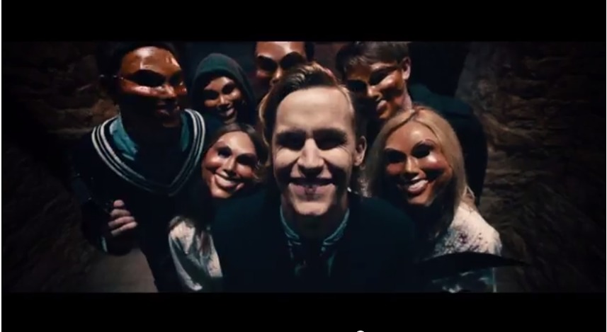 Screen shot of Nathan (top right) from film The Purge