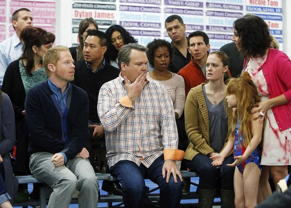 Still of Jesse Tyler Ferguson, Eric Stonestreet and Jennifer DeFilippo in Moderni seima (2009)