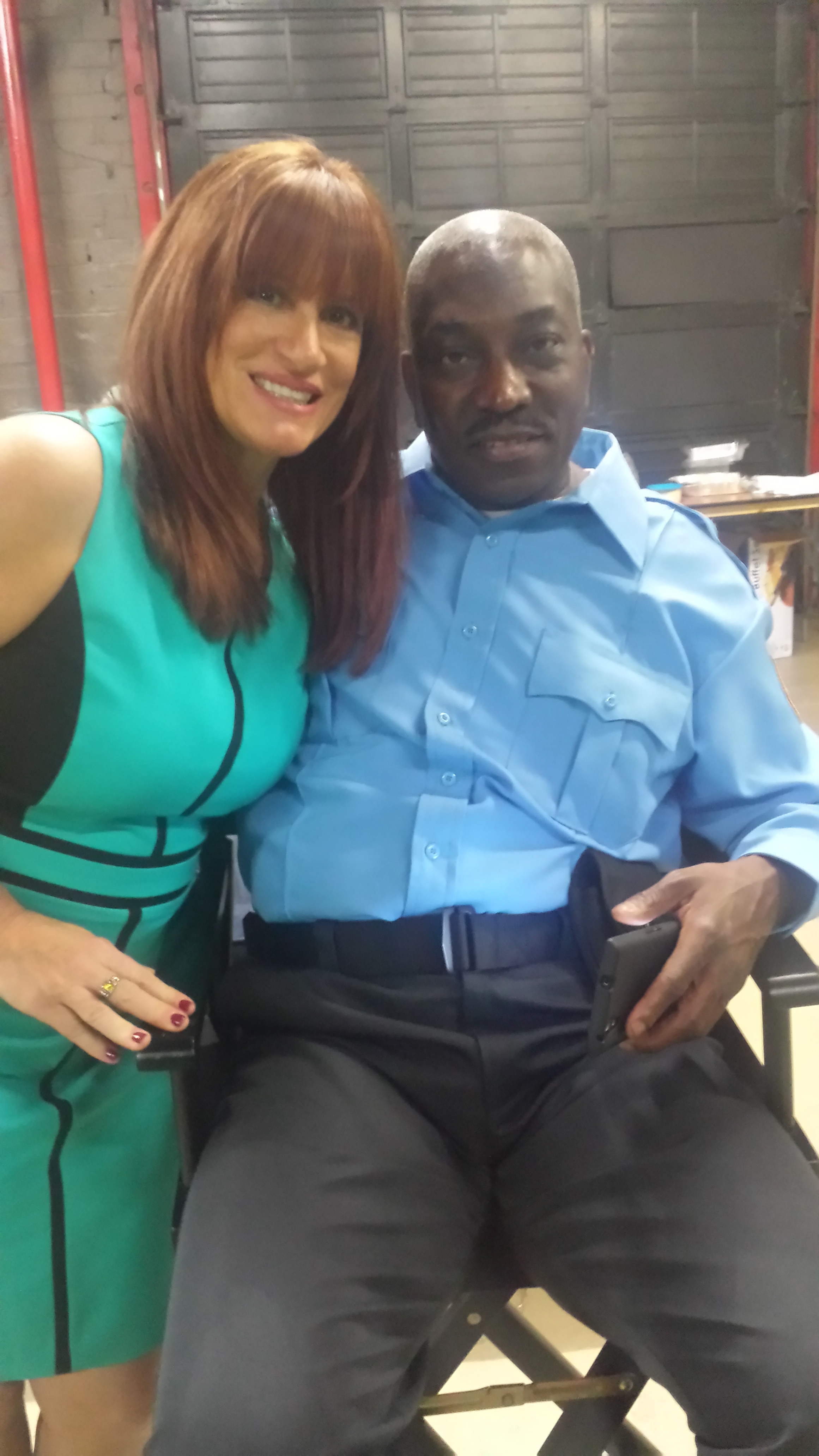 Clifton Powell(Capt. Pearson) and Connie Romano(News Reporter) on the set of 