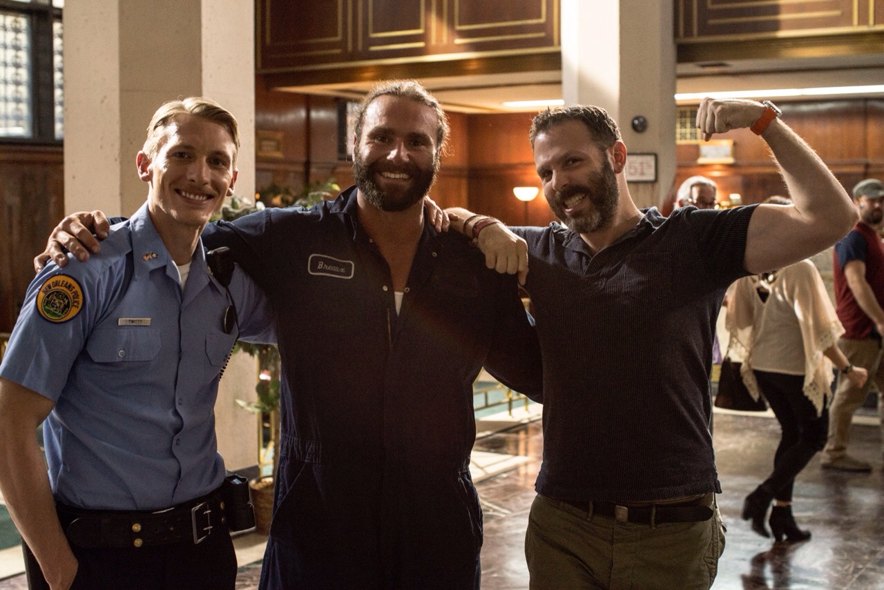 James Landry, Chad Lail & dir Nic Kalilow pose for a photo on the set of Carter & June