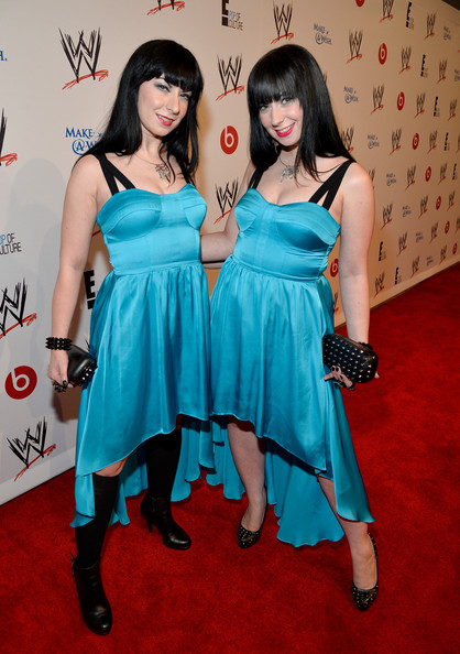 Jen (left) and her twin sister, Sylvia (right), at the WWE Make A Wish Event.