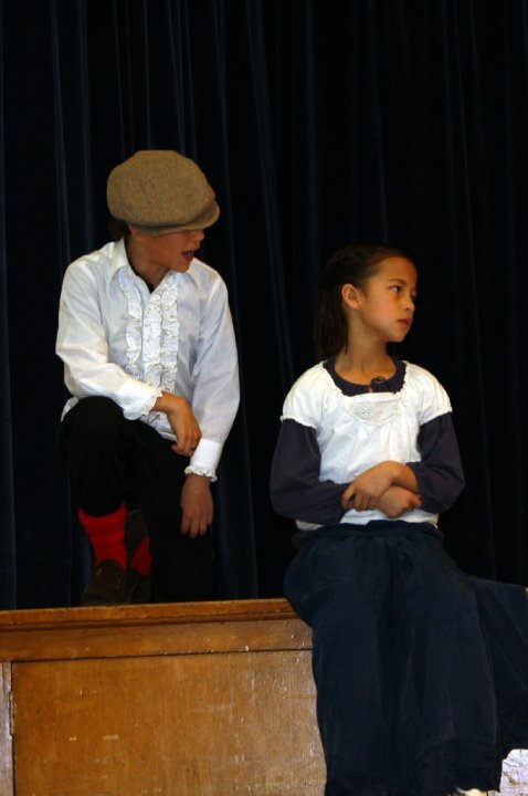 Christian Traeumer and Ella Ngyun as Petruccio and Kate performing the Taming of the Shrew 2009