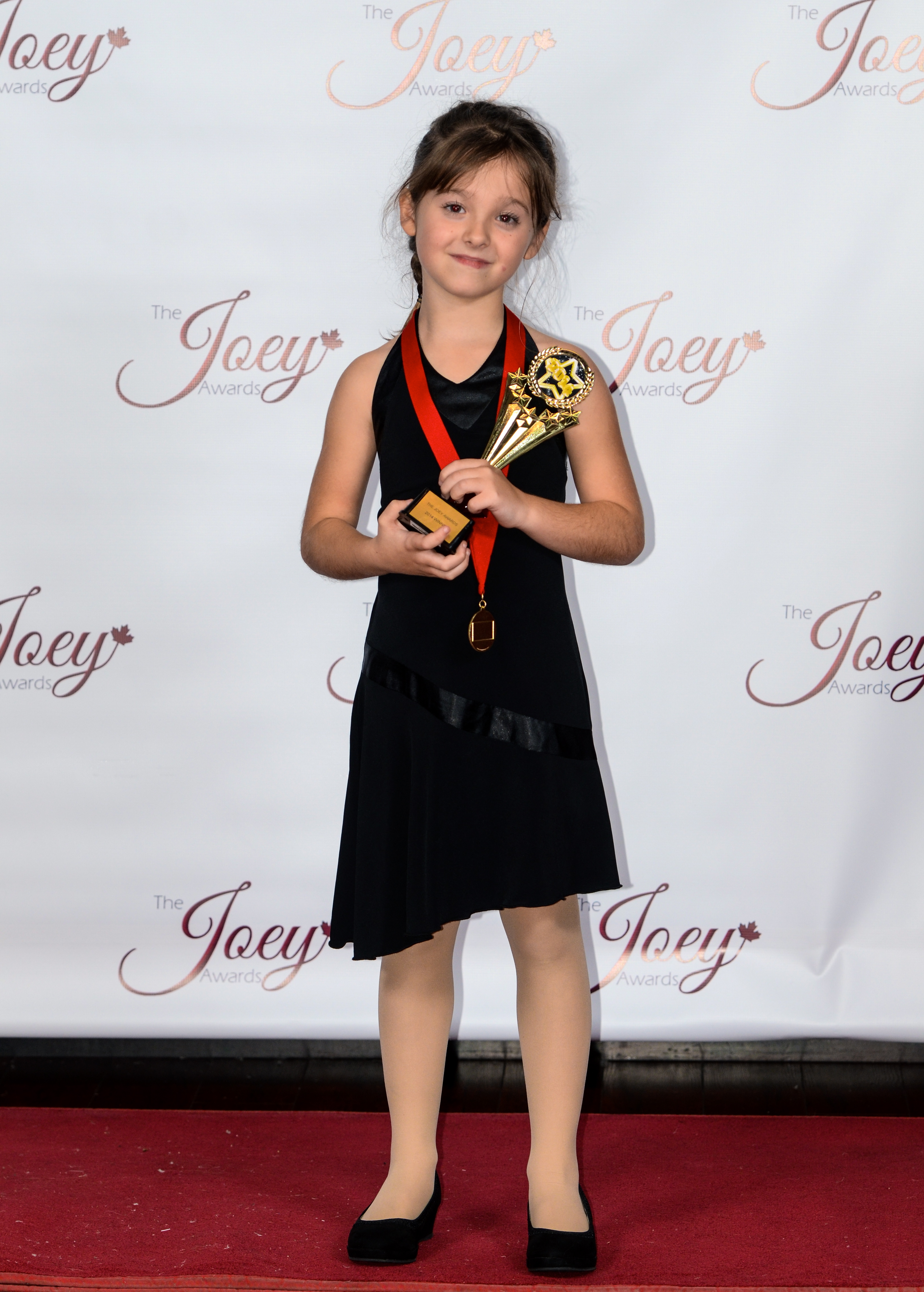 Cadence with her 2014 Joey Award for her lead performance in Florence and the Fish