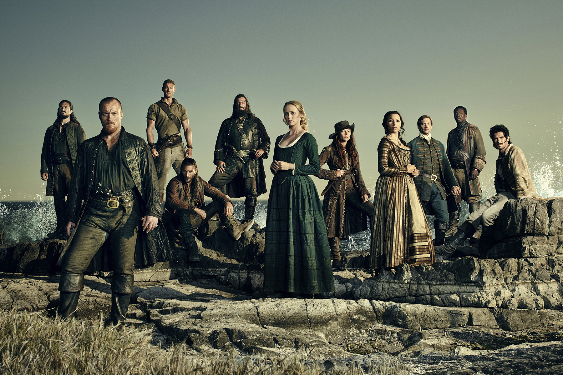 Still of Hakeem Kae-Kazim, Toby Stephens, Ray Stevenson, Luke Roberts, Zach McGowan, Luke Arnold, Jessica Parker Kennedy, Tom Hopper, Clara Paget and Hannah New in Black Sails (2014)