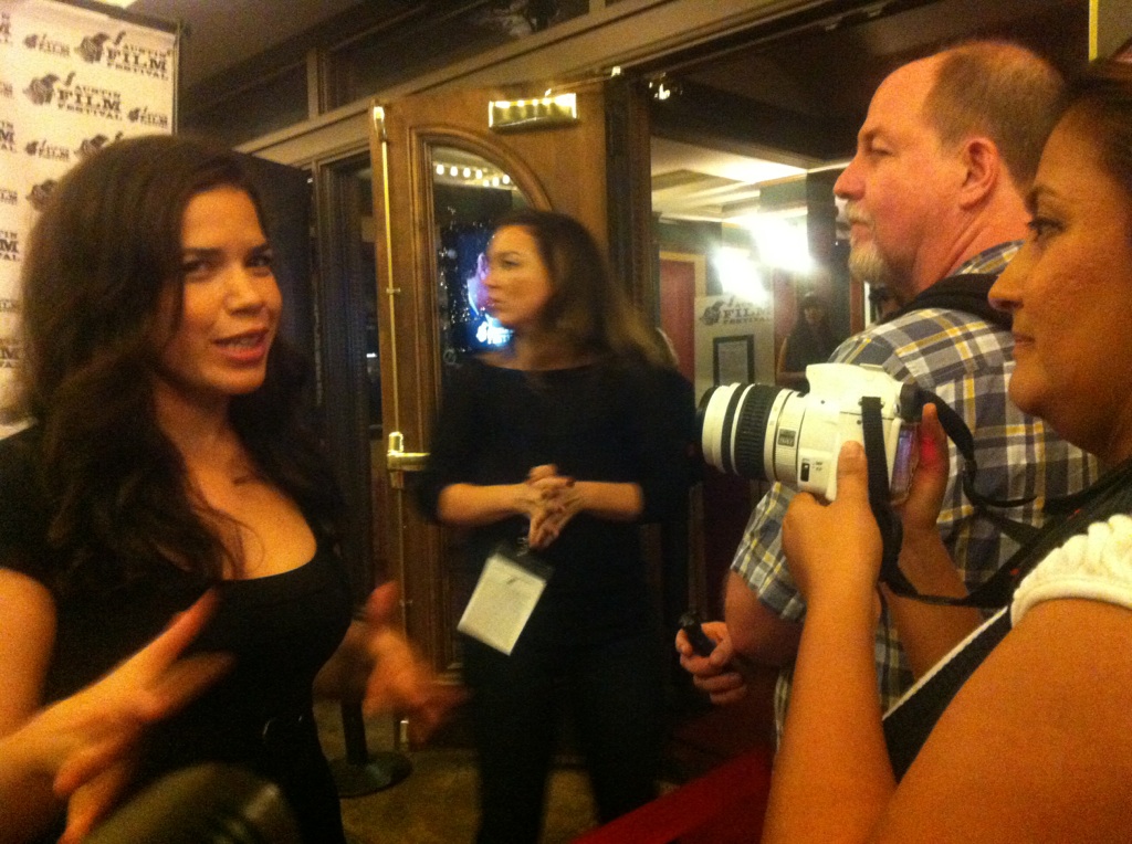Liz Casanova interviewing America Ferrera at the 'It's a Disaster' red carpet screening.