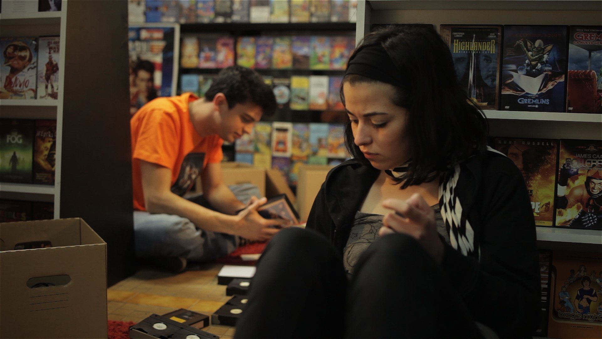 Margarida and Tiago in the Videostore