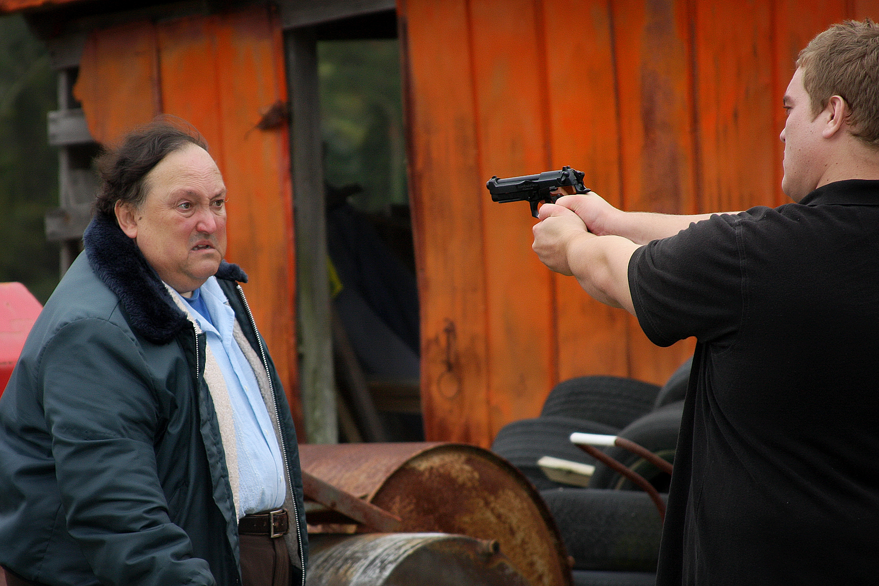 LEE ARMSTRONG plays father Duncan Guthrie held at gunpoint by his son Ewan played by Stephen Linn in the Writeon Prods' short 