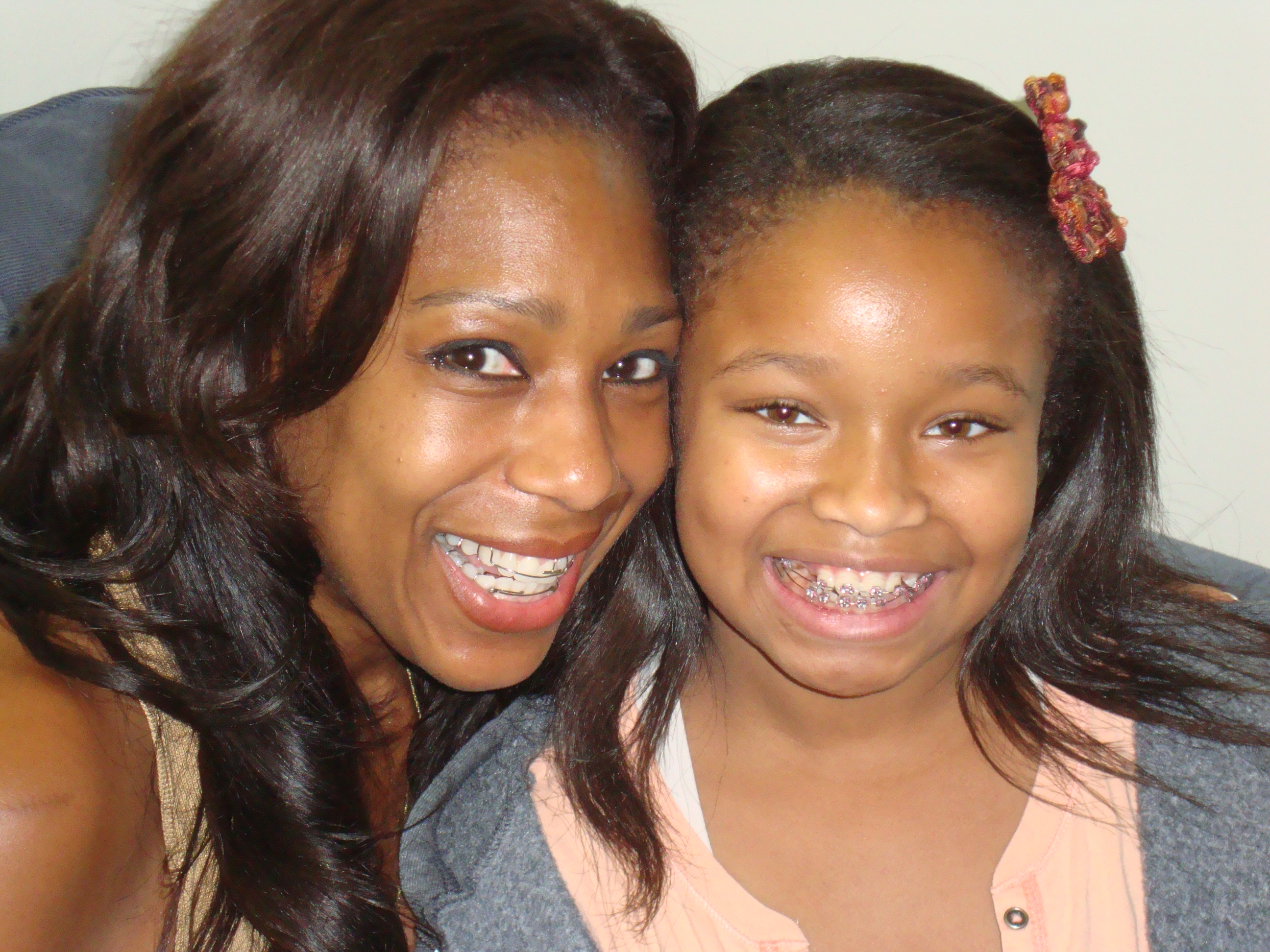 Kiara and Dawnn Lewis with make up braces on the set of 