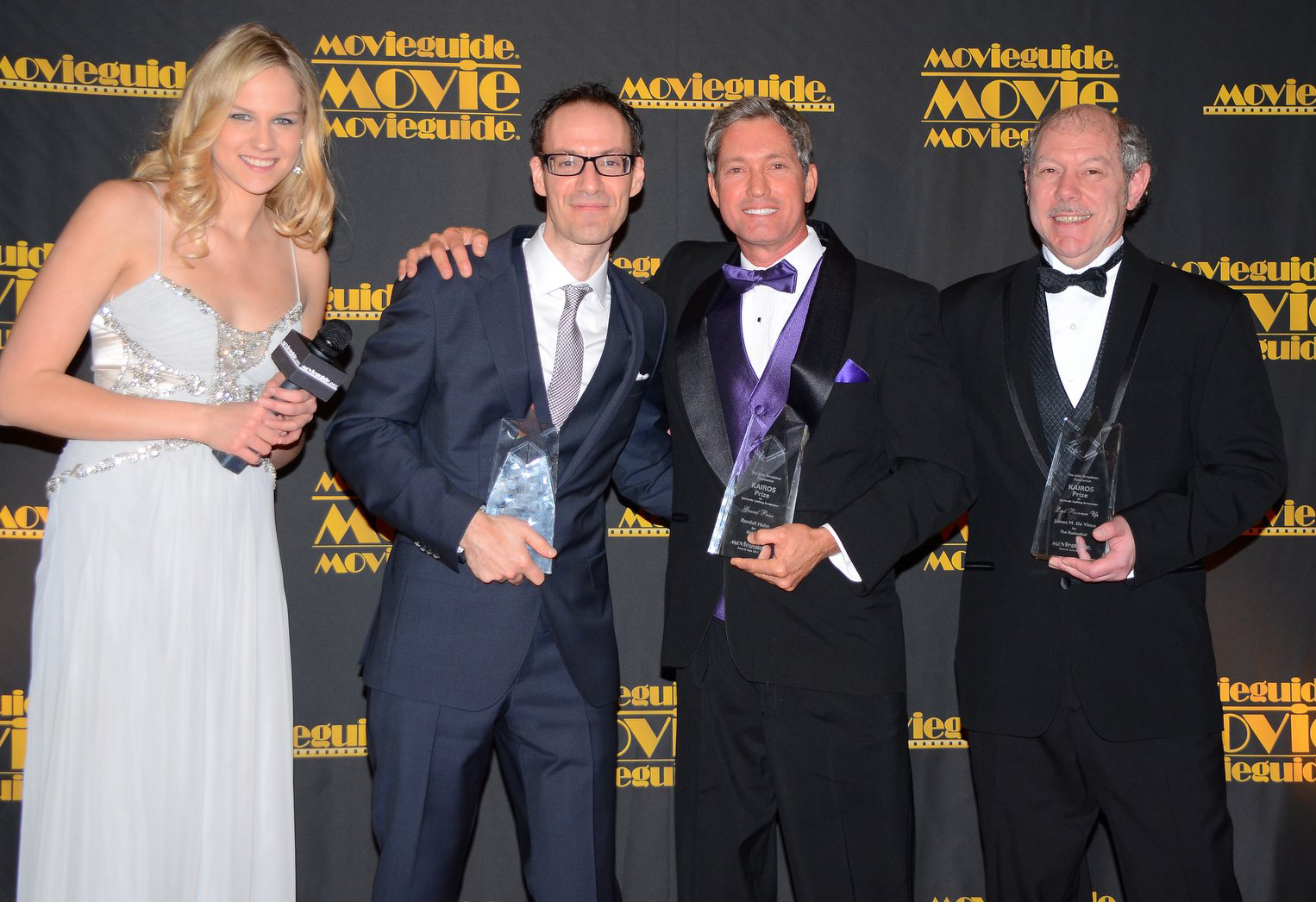 Evy Baehr interviewing Romeo Ciolfi, Randall Hahn, and James M. De Vince at the MovieGuide Awards 2013.