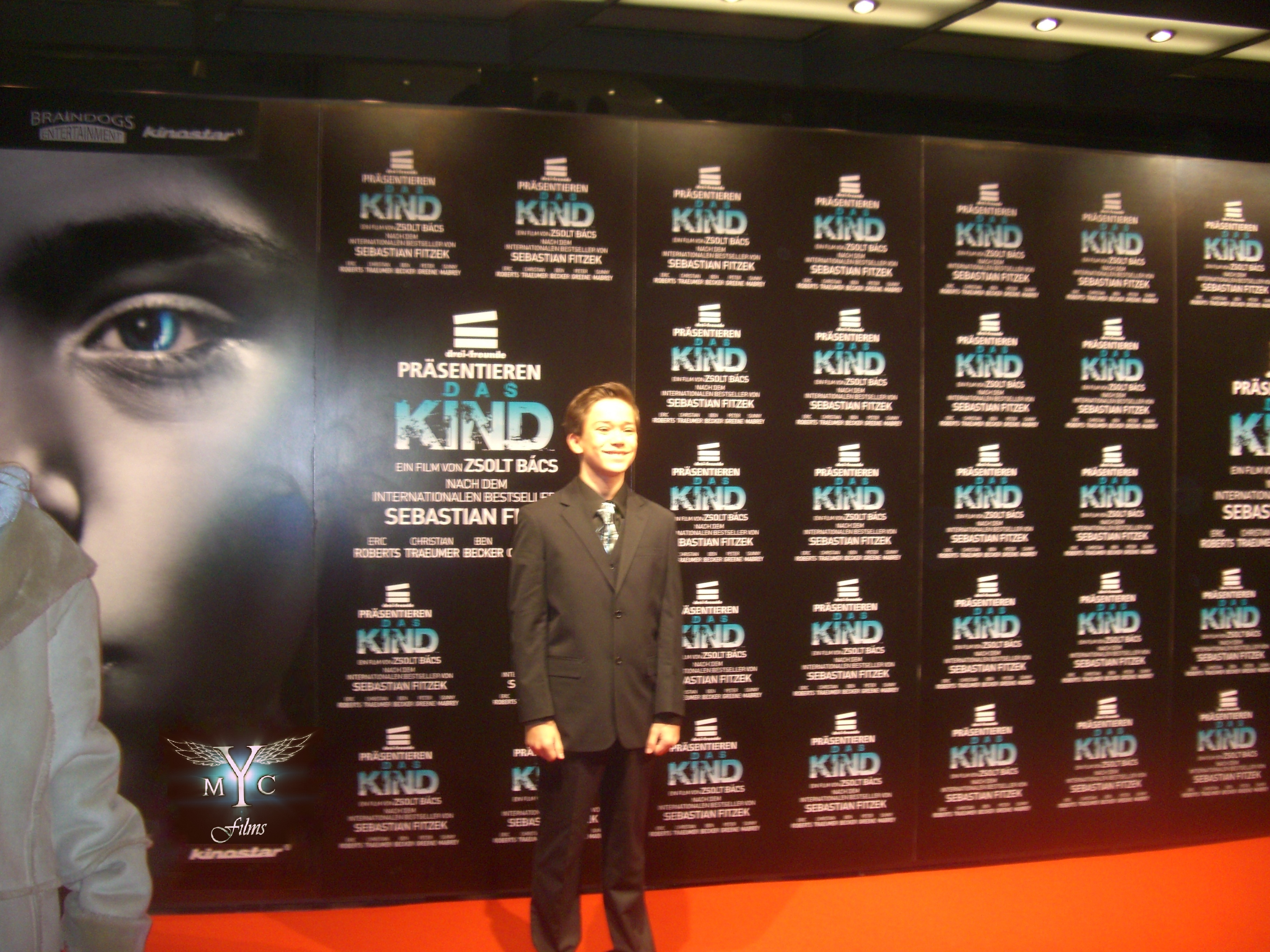 actor Christian Traeumer on the red carpet for the premier of 
