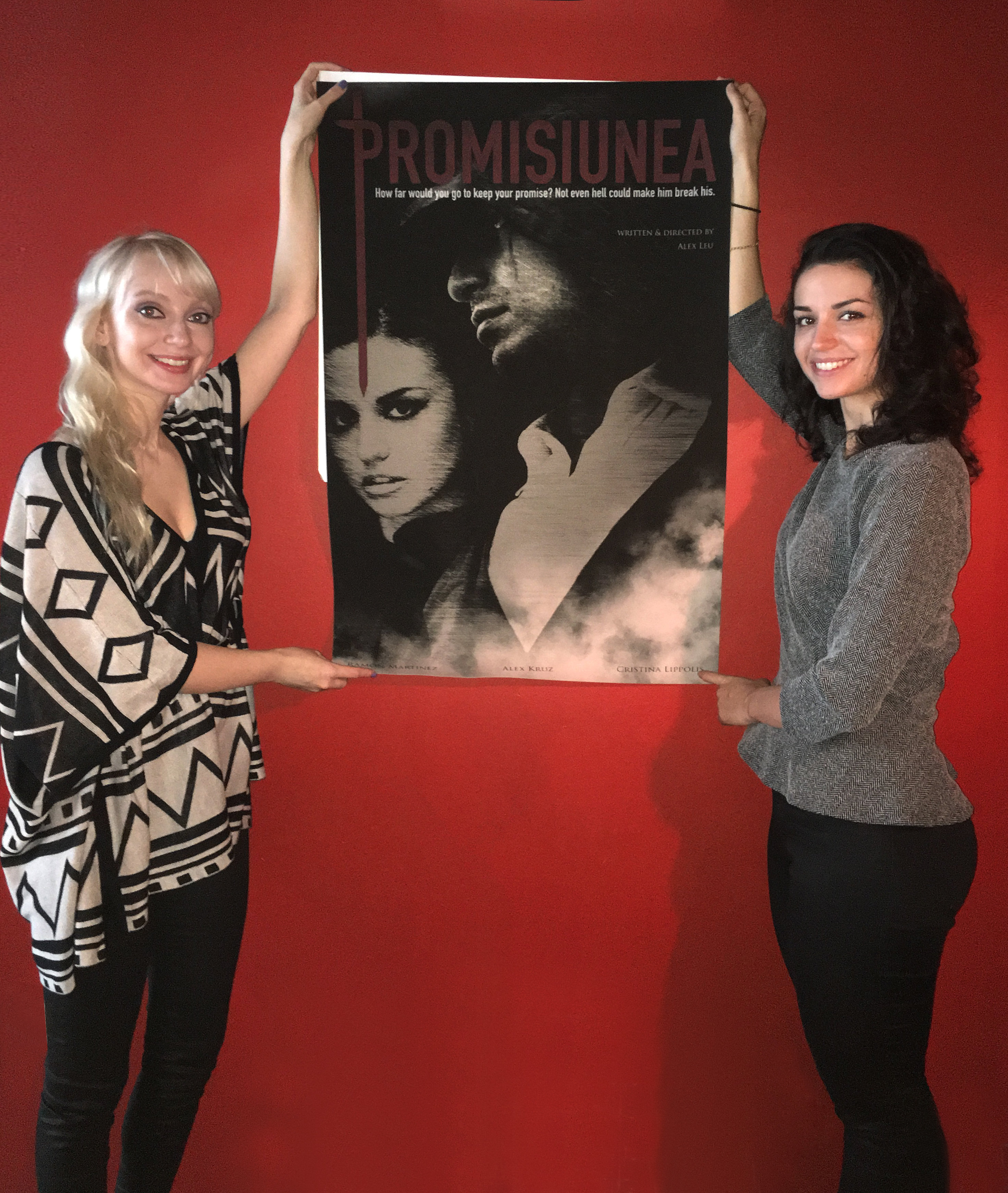 Natalya Lazareva (Creative Director/Producer) and Cristina Lippolis (Lead Actress/Producer) hold the movie poster up for the film Promisiunea