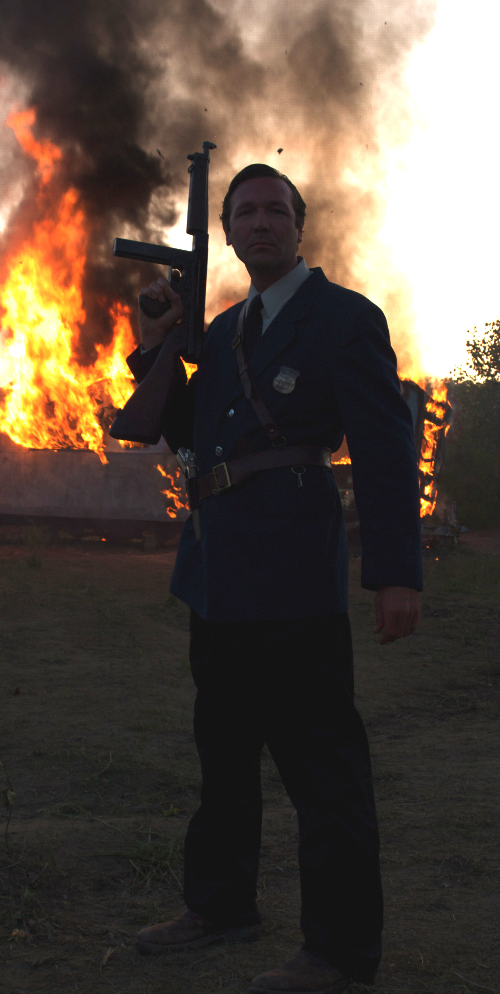 Wade Smith as a Pinkerton Guard on the burning set of 