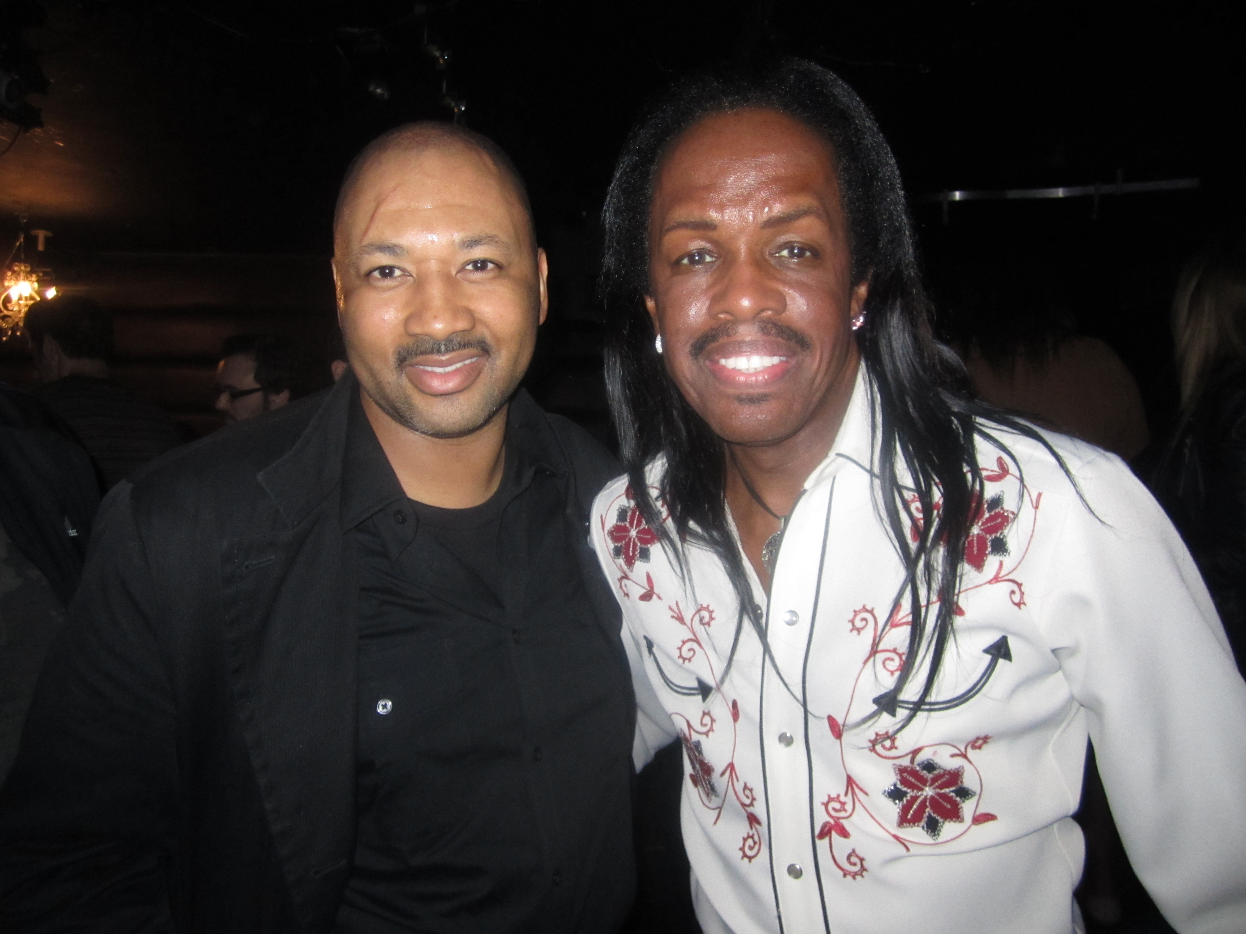 Alex Al with Earth, Wind & Fire's legendary bassist, Verdine White after performing together at live TV show. Alex supported the legendary band on keyboards and bass.