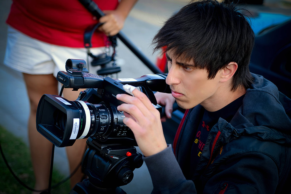 Writer-Director Addison Sandoval filming on location in South Central, Los Angeles.