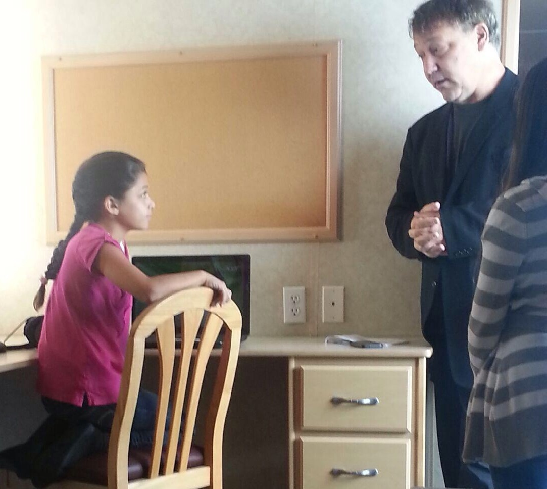 Jasmine Alveran on the set of Rake with Director Sam Raimi.