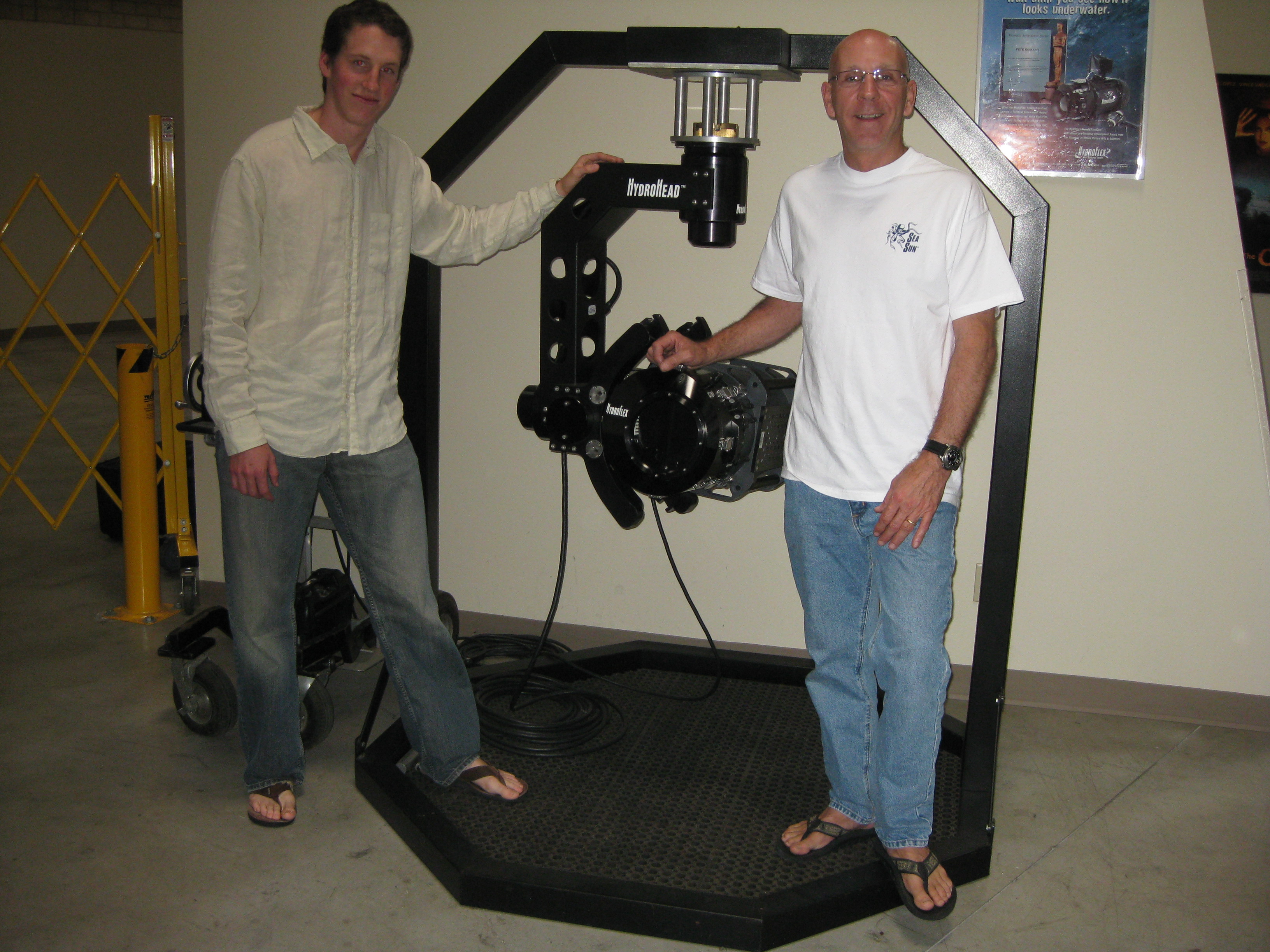 Still of David James Goulard and Pete Romano next to a cool HydroFlex 435 RemoteAquacam, the 435 Remote AquaCam provides 100% video for remote viewing.