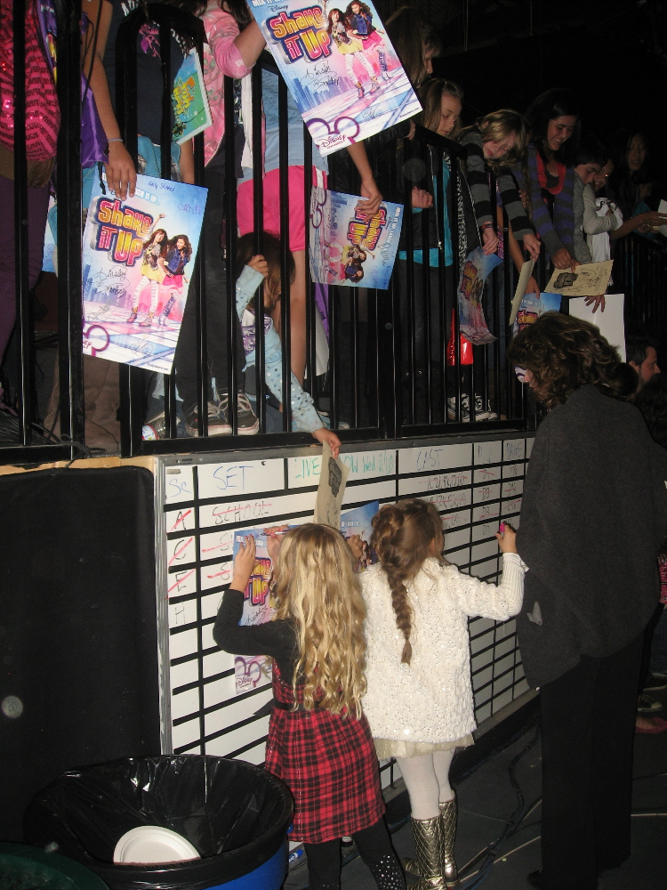 Nov. 2010, Emily and Caitlin signing autographs on the set of Disney's Shake It Up!