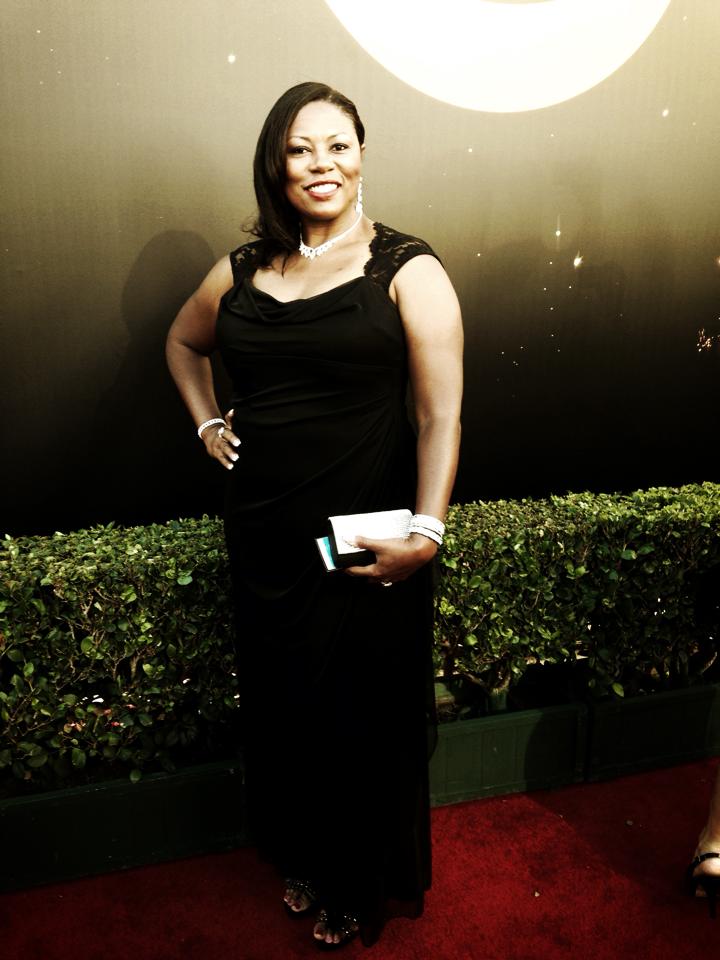 On the red carpet at the 65th Primetime Emmy Awards.