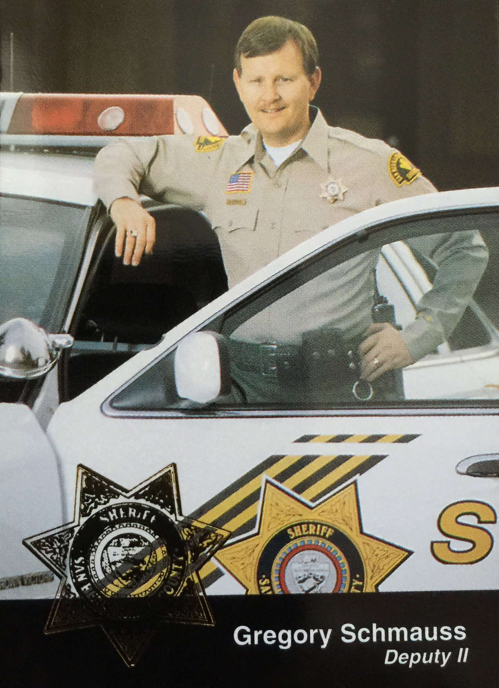 Standing by my San Bernardino County patrol car (1995). Our department issued a type of 