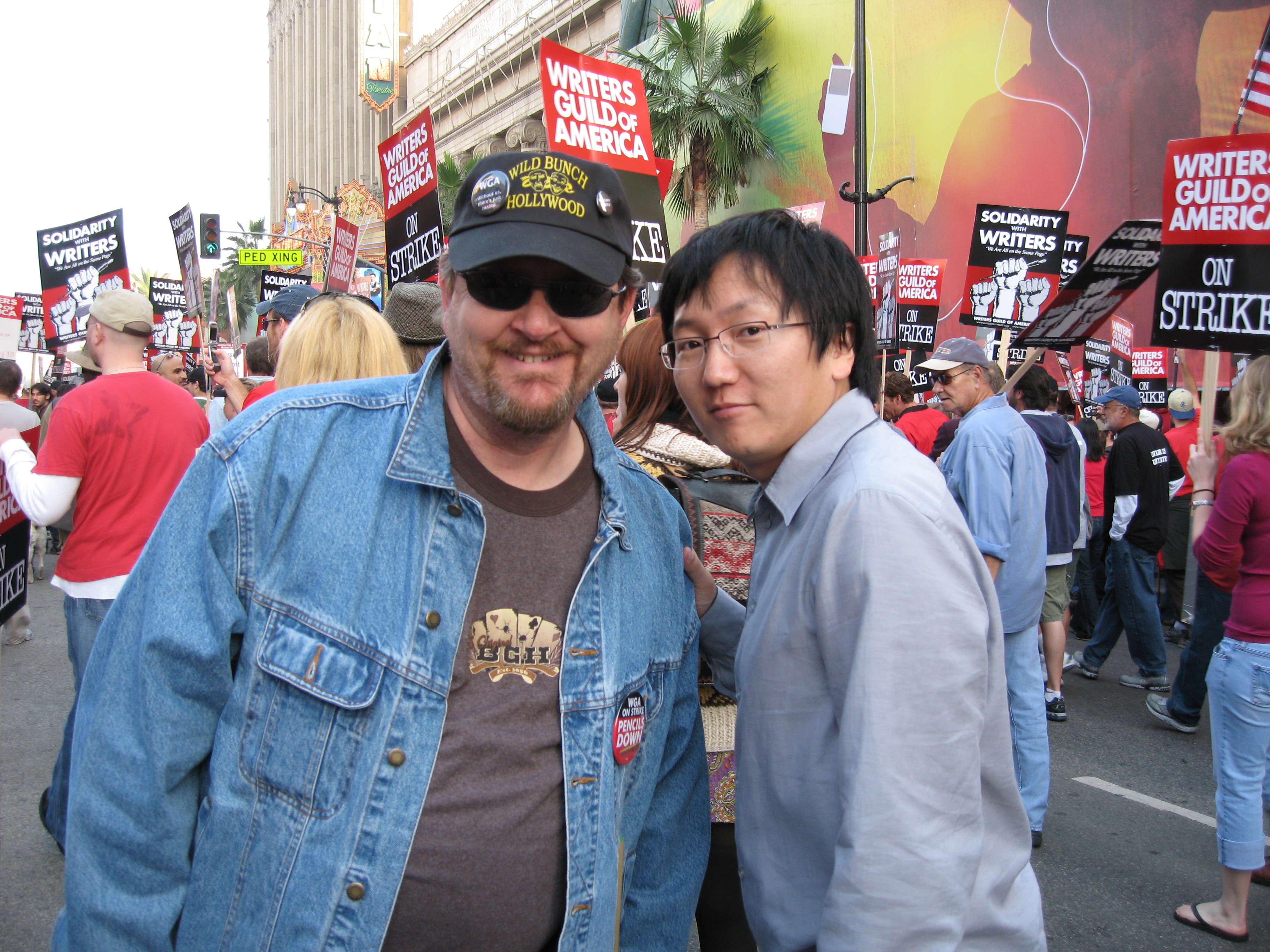 Gregory Schmauss with Masi Oka at the WGA Writer's Rally event in Hollywood, California.